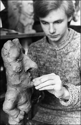 Photograph of Richard Hughes creating a Groggs caricature