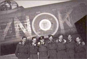 Photo of Stanley Plaskett & crew by Lancaster bomber